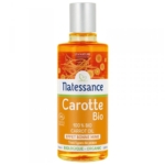 Un flacon de 100 ml d'Huile de Carotte Natessance au liquide orange, un bouchon blanc, une étiquette française représentant des carottes, et adapté à tous les types de peau. Dakar