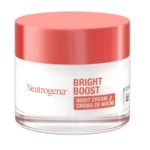 Un pot de Neutrogena Glow Boost Crème Nuit Éclat Revitalisante 50 ml est doté d'un couvercle de couleur corail et d'une étiquette blanche avec le nom Neutrogena en texte rouge et orange, affiché en anglais et en français. Dakar