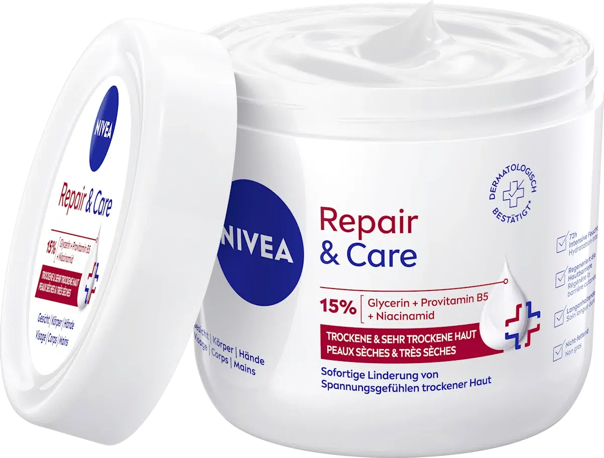 Un récipient blanc de 400 ml de Nivea Crème de Soins Intensifs Visage Corps Mains Peau Sèche à très Sèche avec un logo bleu et un texte rouge, étiqueté en allemand ; il contient de la glycérine, de la provitamine B5 et de la niacinamide pour les peaux sèches à très sèches. Dakar