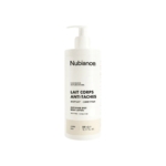 Un flacon pompe blanc étiqueté "Nubiance Lait Corps Unifiant & Hydratant HRB-3 500ml", une lotion pour le corps aux propriétés unifiantes et hydratantes. Le texte apparaît en français et en anglais. Dakar
