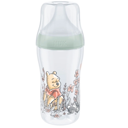 Le Biberon NUK Disney Winnie l’Ourson Perfect Match 260 ml est un biberon transparent avec un bouchon vert et une illustration de Winnie l’Ourson parmi des fleurs, de l’herbe et une abeille. Convient aux bébés à partir de 3 mois. Dakar