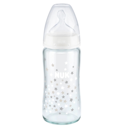 Le biberon en verre blanc NUK First Choice 0-6 mois 240 ml est doté d'un biberon en verre transparent avec un bouchon et une tétine blancs, ornés de petites étoiles blanches autour de la moitié inférieure. Dakar
