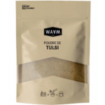 Pochette beige de WAAM Poudre de Tulsi BIO 100g avec une partie transparente dévoilant le produit à l'intérieur. L'emballage comporte des instructions et des informations sur le recyclage. Dakar