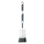 Une Brosse Biberon et Tétine Reer avec Éponge de Nettoyage 1 Pièce avec des poils noirs en bas et un crochet de suspension en haut