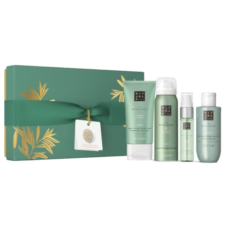 The Rituals The Ritual Of Jing Coffret Cadeau pour Femme est présenté dans un coffret vert avec un motif en feuille d'or, un ruban et une étiquette, et comprend quatre produits de bain et de corps verts assortis : un tube, deux flacons et un distributeur de mousse. Dakar