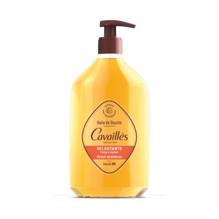 Un flacon jaune de 750ml d'Huile Bain et Douche Veloutante Cavaillès avec une pompe marron, labellisée pour les peaux sensibles et enrichie en amande bio. Dakar