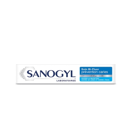 Un tube blanc de Sanogyl Soin Bi Fluor Prévention Caries 75ml comporte un texte bleu et noir sur le devant, y compris "Soin Bi-Fluor prévention caries" et "Laboratoires". Dakar