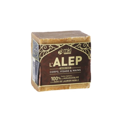 Un bloc de Savon d'Alep MKL 200 g avec une étiquette noire et dorée