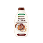 Un flacon de Garnier Ultra Doux Shampooing Nourrissant Lait de Coco et Macadamia 300 ml pour cheveux normaux à secs