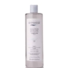 Un flacon de BYPHASSE Solution Micellaire Démaquillante au Charbon Actif PURE SKIN doté d'un bouchon blanc. L'étiquette est bilingue, présentant un texte en français et en anglais, mettant en valeur ses propriétés 4 en 1. Le flacon transparent laisse apparaître le liquide clair à l'intérieur, offrant une capacité généreuse de 500 ml. Dakar