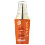 Un flacon de Sérum Booster Eclat Anti-Tache Makari Extreme Argan Et Carotte