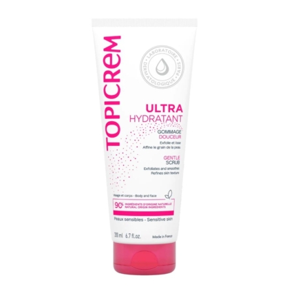 Tube blanc de 200 ml de Topicrem Gommage Douceur, pour peaux sensibles, avec inscription rose et grise et bouchon à clapet rose. Fabriqué en France, il exfolie et lisse la peau en douceur. Dakar