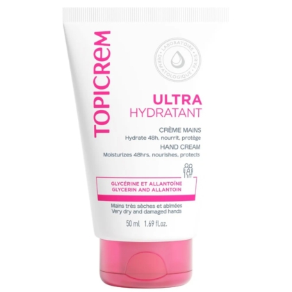 Le tube de 50 ml de Topicrem Crème Mains Ultra-Hydratante présente un corps blanc, un bouchon rose et un texte rose-gris. L'étiquette met en avant la glycérine et l'allantoïne pour le soin des mains très sèches ou abîmées. Dakar