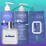 Le Coffret Kit Mes Premiers Soins Bébé + Éponge Bain OFFERT d'Uriage propose quatre produits de soins essentiels pour bébé - lotion, crème nettoyante, lingettes et eau parfumée - dans un emballage bleu et blanc, ainsi qu'une éponge de bain gratuite. Dakar