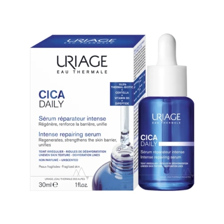 Un flacon compte-gouttes bleu de BARIÉDERM CICA DAILY Sérum Peaux Fragilisées 30 ml d'Uriage est présenté à côté de sa boîte, avec des détails en français et en anglais. Le flacon contient 30 ml (1 fl. oz.) de sérum. Dakar