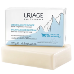 Barre de Uriage Crème Lavante Solide Savon Moussant dans un emballage au design montagnard