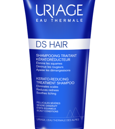Un tube bleu de 150 ml de URIAGE DS HAIR SHAMPOOING TRAITANT KÉRATORÉDUCTEUR comportant un texte blanc et bleu détaillant les bienfaits du produit.