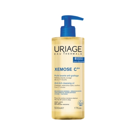 Un flacon de 500 ml d’« Uriage Xemose Huile Lavante Apaisante Peaux Très Sèches À Tendance Atopique », muni d’un doseur bleu et d’une étiquette bilingue français-anglais, laisse entrevoir l’huile nettoyante jaune qu’il contient. Dakar