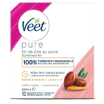 Façade de la boîte de Veet Pâte à Sucre à l'Huile d'Argan Épilation Corps Et Jambes 250 ml, montrant l'image de l'huile d'argan, les détails français et néerlandais, les icônes pour le contenu de 250 ml et les 12 bandes réutilisables. Complète la gamme Veet Pure Crème Dépilatoire. Dakar
