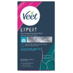 L'image montre le devant d'une boîte Veet Pure Bandes de Cire Froide Bikini et Aisselles, avec du texte allemand, des illustrations de jambes lisses et des détails sur son efficacité sur les cheveux courts et sa formule douce pour les peaux sensibles. Dakar