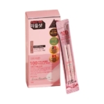 Une boîte rose étiquetée "NYX Professional Makeup Rouge à Lèvres Crème Soft Matte Metallic" avec un texte en coréen se trouve à côté d'un sachet rose assorti, tous deux ornés de détails dorés et blancs rappelant les emballages chics de NYX Professional. Dakar