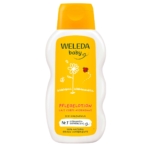 Le flacon blanc et jaune de 200 ml de Weleda Lait Corps Calendula est illustré d'une fleur et d'une coccinelle, avec un texte mettant en avant le calendula, les ingrédients d'origine naturelle et une recommandation de sages-femmes. Dakar