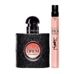 Le coffret BLACK OPIUM EDP Coffret Cadeau Parfum Femme d'Yves Saint Laurent se compose d'un flacon rectangulaire noir scintillant avec un centre rose et d'un vaporisateur de voyage mince et cylindrique avec un capuchon noir. Dakar