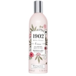 Un flacon de 100 ml de "BERDOUES MILLE FLEURS Parfum Eau de Toilette" présente un design floral avec des fleurs et des feuilles roses et blanches, avec une étiquette indiquant "94% d'ingrédients d'origine naturelle" sur fond blanc. Dakar
