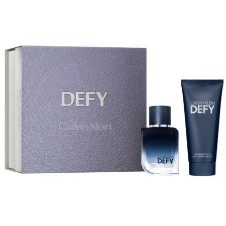 Le Coffret Cadeau Defy de Calvin Klein comprend une eau de parfum de 50 ml et un gel douche de 100 ml, tous deux étiquetés "DEFY" et "Calvin Klein", présentés dans un élégant coffret cadeau. Dakar
