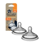 Two clear TOMMEE TIPPEE Lot de 2 tétines Closer to nature débit épais baby bottle nipples for 6 months+ are shown in front of their packaging. Le lot comprend deux tétines à débit rapide. Dakar
