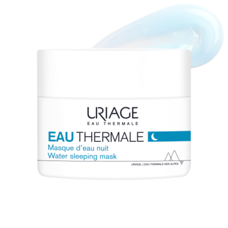 Un pot de 50 ml de Masque de Nuit Eau Thermale d'Uriage à la texture crémeuse bleue. L'emballage majoritairement blanc présente des touches de bleu et du texte en français et en anglais. Dakar