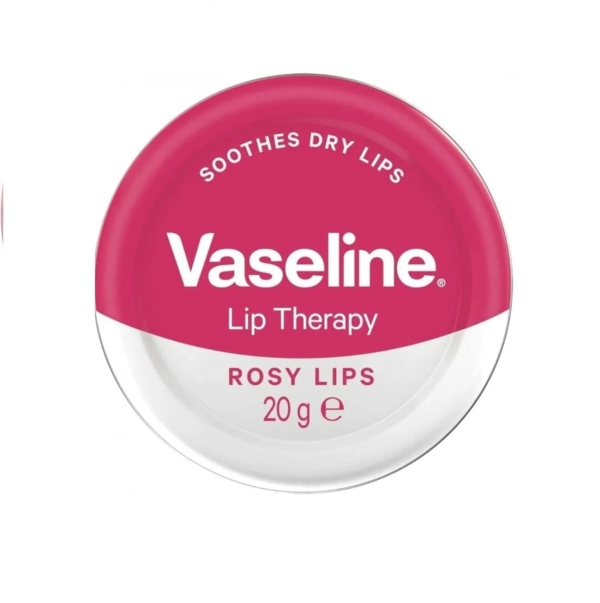 Flacon rond de VASILINE Lip Therapy - Baume Hydratant pour Lèvres en Lèvres Rosées. Le couvercle rose et blanc porte l'inscription « Apaise les lèvres sèches » et « 20 g e. Dakar