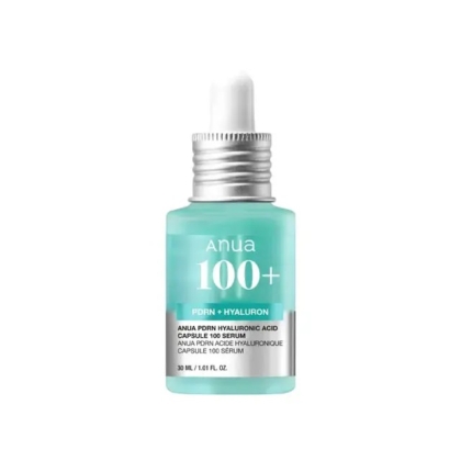 Un flacon bleu-vert d'Anua PDRN Hyaluronic Capsule 100 Sérum Hydratant et Anti Age 30 ml, avec un bouchon argenté, affiche une étiquette avec un texte blanc : « ANUA PDRN Hyaluronic Acid Capsule 100 Serum 30 ML / 1.01 FL. OZ. Dakar