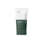 Un tube d'Anua Crème Solaire Spf50 Hydratante ET Soyeuse Heartleaf 50 ml avec un couvercle blanc et un fond vert foncé, étiqueté en anglais et en coréen, avec SPF 50+ PA++++ clairement sur le devant. Dakar