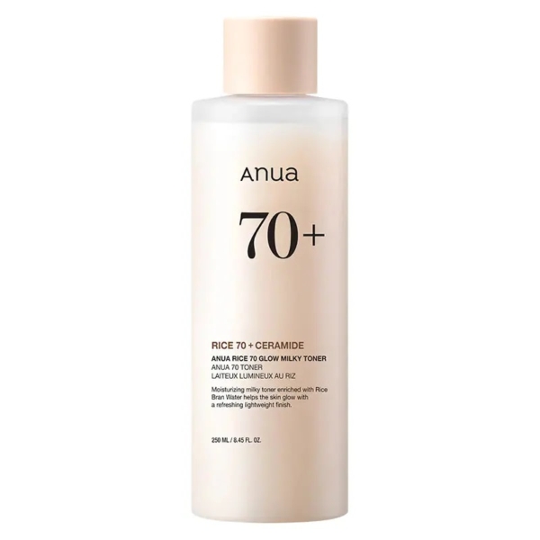 Le Tonique Laiteux Éclaircissant Rice 70+ Ceramide Glow Milky d'Anua 250 ml contient de l'extrait de riz et de la céramide pour une texture laiteuse et une hydratation légère. Le flacon opaque avec bouchon à vis beige contient 250 ml, enrichi en Essence Réparatrice KSECRET SÉOUL 1988. Dakar