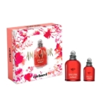 Le coffret Amor Amor Coffret Cadeau Parfums de Cacharel se présente sous la forme d'une boîte décorative fleurie avec deux flacons rouges, un grand et un petit, présentés côte à côte. Dakar
