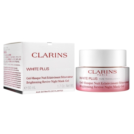 Le Gel-masque de nuit rénovateur à l'extrait d'acérola 50 ml de CLARINS, également connu sous le nom de Clarins White Plus Brightening Revive Night Mask-Gel, présente un pot et une boîte blancs élégants avec un texte français et anglais accentué par une marque rouge. Dakar