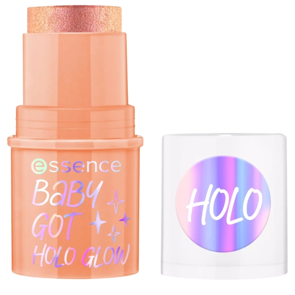 Le stick illuminateur Essence « Baby Got Holo Glow » 5g, connu sous le nom d'Essence Stick Illuminateur, est de couleur orange avec un dessus scintillant. Le capuchon blanc à côté affiche « HOLO » en lettres irisées. Dakar