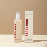 L'Essence Réparatrice Mucine d'Escargot 97% + Riz KSECRET SÉOUL 1988 100 ml est un soin à pompe, présenté dans un coffret étiqueté « Séoul 1988 ». Doté d'un texte rouge et du Tonique Apaisant à l'Essence de Skin1004, son fond beige doux ajoute de l'élégance. Dakar