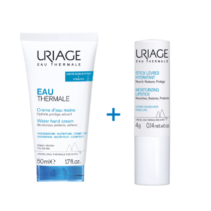 Image de deux produits de soin Uriage. A gauche, un tube de 50 ml de crème mains Eau Thermale au beurre de karité et à la vitamine E. A droite, un tube de 4 g de rouge à lèvres hydratant. Un signe plus est présent entre les deux. Les deux sont dans un emballage blanc. Dakar
