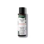 Flacon brun foncé d'huile de macadamia 100 % pure Activilong avec bouchon noir. L'étiquette, ornée de feuilles vertes et de touches roses, indique que ce produit préserve la couleur et nourrit les cheveux et le corps. Texte en français et en anglais. Dakar