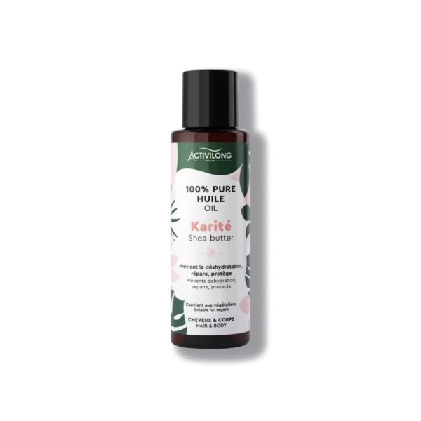 Un flacon d'huile de beurre de karité 100 % pure Activilong, destiné aux cheveux et au corps. L'étiquette présente des informations sur la prévention de la déshydratation et des propriétés réparatrices et protectrices. Le motif représente des feuilles vertes sur fond blanc. Dakar