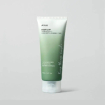 Tube de mousse nettoyante en profondeur Anua Heartleaf sur fond uni. Le design est vert avec un texte blanc détaillant des ingrédients comme l'extrait d'Houttuynia Cordata et la quercétine. Le tube est muni d'un bouchon blanc. Dakar