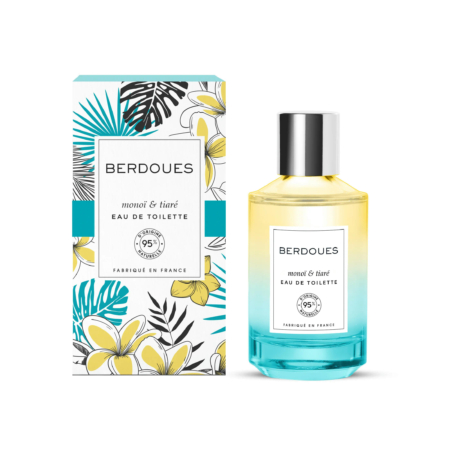 Un coffret coloré aux motifs de feuilles et de fleurs tropicales, à côté d'un flacon d'Eau de Toilette Monoï et Tiaré Berdoues. Le flacon présente un dégradé allant du jaune au turquoise. Le texte indique qu'il est fabriqué en France avec 95 % d'ingrédients d'origine naturelle. Dakar