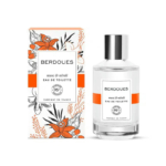 Un flacon d'Eau de Toilette Berdoues Muse & Néroli est présenté devant son coffret. Ce dernier présente des motifs floraux orange et noirs. L'étiquette indique que l'eau est 95 % naturelle et fabriquée en France. Le flacon contient un liquide transparent. Dakar