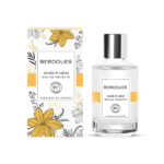 Un flacon de parfum étiqueté « Eau de Toilette Berdoues Vanille & Safran » est présenté à côté de son coffret assorti. Ce dernier est orné d'illustrations florales jaunes et noires. Les deux articles portent l'étiquette « 95 % d'origine naturelle ». Dakar