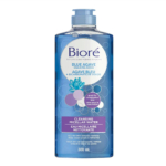 Un flacon d'Eau Micellaire Nettoyante Bioré à l'Agave Bleu et au Bicarbonate de Soude. Ce flacon de 300 ml arbore une étiquette violette avec un texte blanc et des images d'agave, soulignant son utilisation pour les peaux mixtes. Dakar