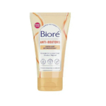 Un tube d'exfoliant Bioré Anti-Boutons à l'acide salicylique et au charbon. L'emballage arbore un design beige et orange, ainsi qu'une description de ses propriétés anti-acnéiques et de ses ingrédients. Dakar