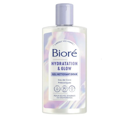 Flacon de gel nettoyant doux Bioré Hydratation & Éclat. L'étiquette indique qu'il contient de l'eau de coco et des prébiotiques, conçus pour les peaux sèches et sensibles. Le bouchon est lavande et l'étiquette arbore un design pastel irisé. Dakar
