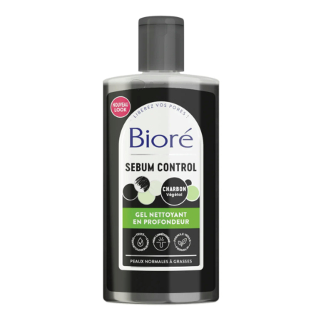 Un flacon de nettoyant visage Bioré Sebum Control au charbon actif. L'étiquette noire et verte présente un texte en français soulignant ses propriétés nettoyantes en profondeur pour les peaux normales à grasses. Le flacon est doté d'un bouchon gris. Dakar